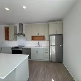 Kitchen Interior with Island and Stainless Steel Appliances