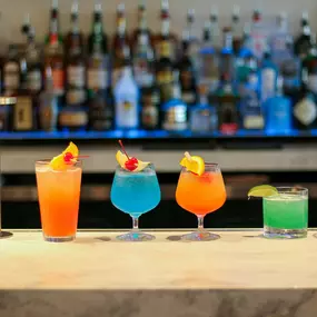 Array of cocktails on bar