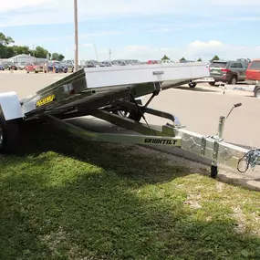 Explore easy loading and unloading with the Aluma 6810H TILT trailer available at M&G on 55, offering a practical solution for your hauling needs.