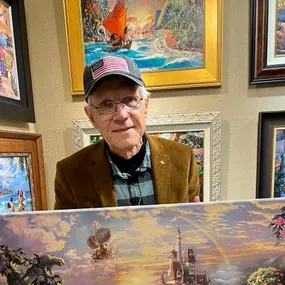 Thomas Kinkade Studios Legacy Artist, Dirk Wunderlich at a Monterey Gallery event.