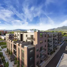 a rendering of a building with a blue sky in the background