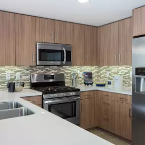 Kitchen With Brown Cabinets