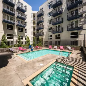 pool and spa and exterior of apartment building