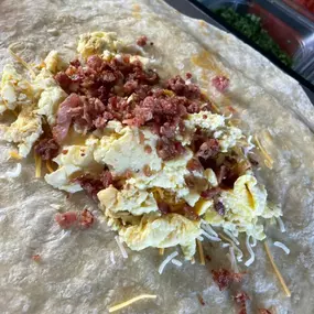 Fuel your morning with the ultimate breakfast burrito—packed with fresh ingredients and big flavors!