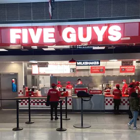 Photograph of the entrance to the Five Guys restaurant at Concourse B in Dulles International Airport in Dulles, Virginia.