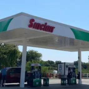 Sinclair gas station fueling island