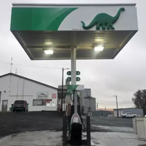 Sinclair gas station fueling island.