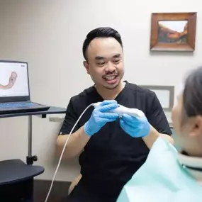 Dr. Richie Tran treating patient - Dentist Riverside - TranscenDental Smiles