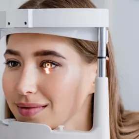 Women getting eye exam done