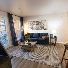 a living room with a couch and a coffee table