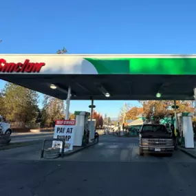 Sinclair gas station fueling island