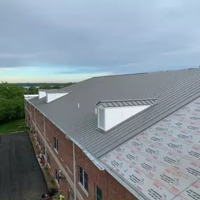 commercial sloped metal roof installation project