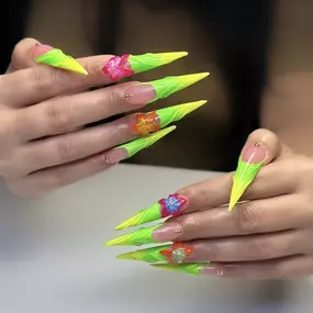 Vibrant neon yellow and green Gel X nails with bold, eye-catching designs.