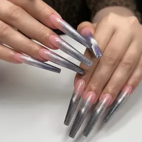 Trendy chrome long Gel X nails for a sleek, metallic finish.