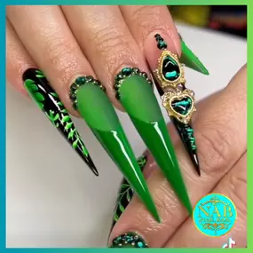 Elegant emerald green nails with a matte and shiny combo finish.