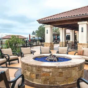 Gather by the fire pit with friends and family