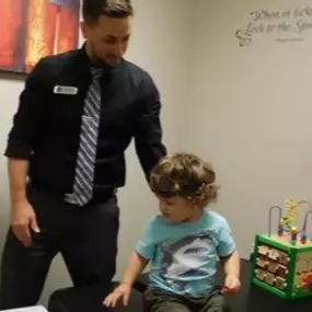 Dr. Justin Phillips is a chiropractor who specializes in pediatric chiropractic care. He works with patients of all ages.