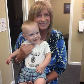 Dr. Ruth Nielson with a pediatric patient