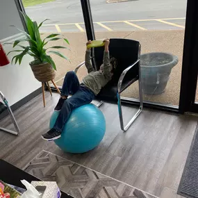 Pediatric patient in the lobby of Total Health Chiropractic Cleveland