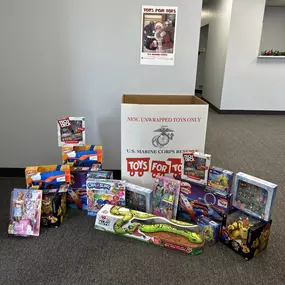 Bring by new, unwrapped toys for Toys for Tots at our office!