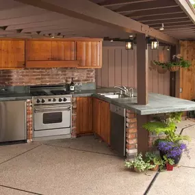 Why stop indoors? Our outdoor kitchen options make cooking outside a breeze!