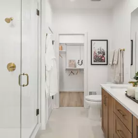 Lavish primary baths with dual sink vanities
