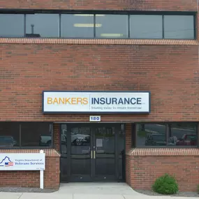 Front entrance of our Wytheville VA insurance agency office two story red brick building