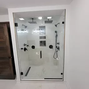 Elevate your bathroom with custom shower door installation services from Suburban Glassworks. Our team specializes in installing sleek, high-quality doors that add style and functionality to your space, creating a polished and modern look.