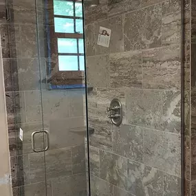 Elevate your bathroom with custom shower door installation services from Suburban Glassworks. Our team specializes in installing sleek, high-quality doors that add style and functionality to your space, creating a polished and modern look.