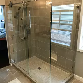 Elevate your bathroom with custom shower door installation services from Suburban Glassworks. Our team specializes in installing sleek, high-quality doors that add style and functionality to your space, creating a polished and modern look.