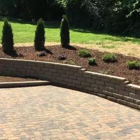 Our experienced team can build multifunctional retaining walls to fortify and beautify your landscape.