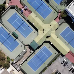 Check out our facility. Here is the view of some LNRC tennis courts, fitness center and pool.