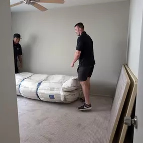 Two of our AZ Student Mover guys on  site moving our customer.  We take pride in wrapping items so furniture is moved safely and doesn't get damaged.