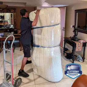 AZ Student Movers on site moving our customer.  We take pride in wrapping items so furniture is moved safely and doesn't get damaged.