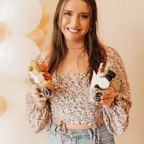 My name is Grace Ramsey and I created Board & Co. I graduated from the University of Kentucky in 2019 and started making charcuterie boards one year later. My true love for cheese and charcuterie came in college, when I studied abroad in Spain. I will never forget the Manchego and Jamon Iberico I had the pleasure of trying there. A proper cheese pairing can be so simple yet divine. I believe my passion for art and creativity drew me to the world of charcuterie boards. Each board is like a blank 