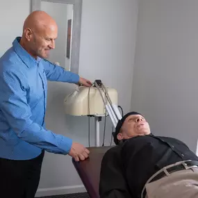 Dr Figler with a patient who is getting spinal decompression