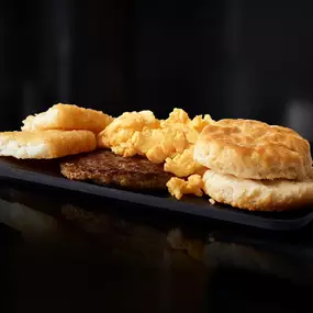 McDonald's Big Breakfast: biscuit, scrambled eggs, hot sausage, and hash browns.