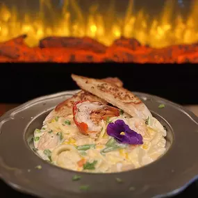 Chef Feature: “Seafood Tortellini Alfredo” is a pasta dish made out of Cheese Tortellini, Baby Shrimp, half Lobster tail mixed with Primavera Vegetables and Alfredo Sauce. Accompanied by Garlic Bread.