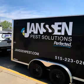 Janssen Pest Solutions work truck outside office in Des Moines.