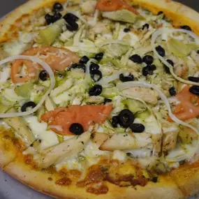 Freshly baked quiche filled with vegetables and cheese, a popular breakfast and lunch option at Cranberry Hills Eatery & Catering in Phoenix, AZ.