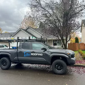 J&J Roofing's work truck