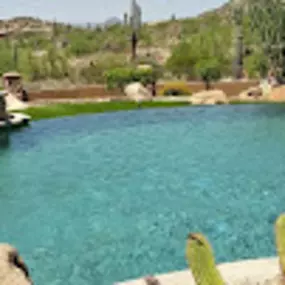 Bild von Backyard Oasis Pool and Spa