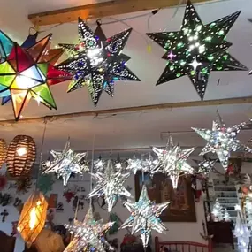 Handcrafted Mexican Star Lanterns – Illuminate your home with these stunning, artisan-made star lanterns. Featuring intricate designs and vibrant glass details, they add warmth and elegance to any indoor or outdoor space.