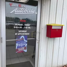 Tom & Ed's Autobody in Burns Harbor – Entrance Door & Hours Signage at Tom & Ed's Autobody