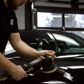 One of our Team Members hard at work on a paint correction!