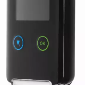 A side profile of the Draeger Interlock 7000 showcases its sleek, compact design.