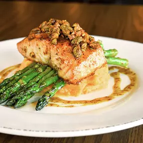 Maple-glaze roasted salmon, candied pistachios, roasted asparagus, and garlic mashed potatoes.