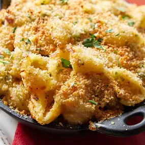 Macaroni with homemade cheese sauce and kettle chip crust.