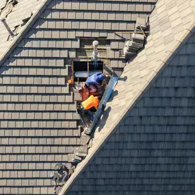 Shepherd Tile Roofing Crew repairing slate tile roof