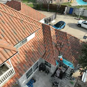 Roof tile Repair in process from Shepherd tile Roofing crew